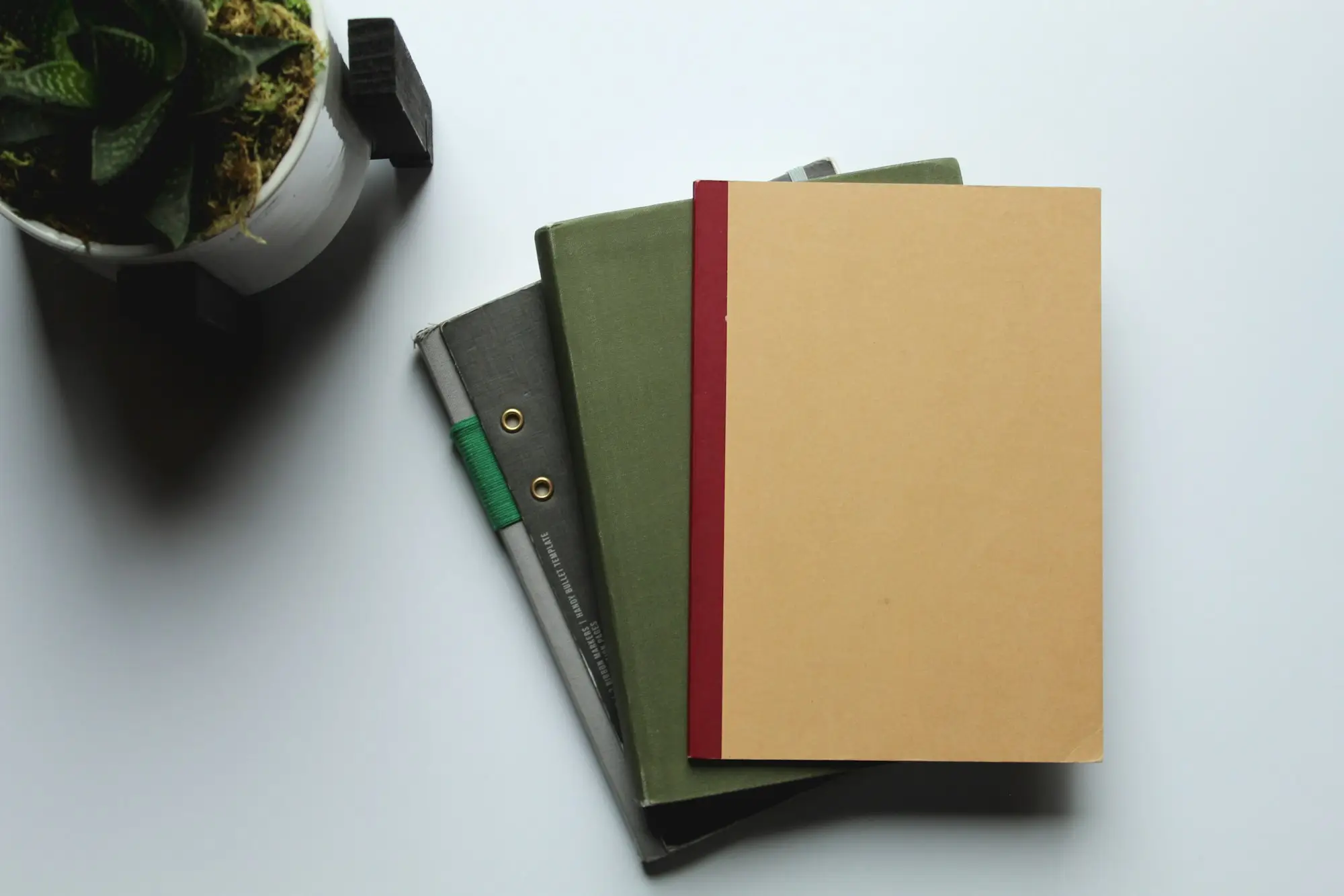 Brown document folder lying on a clean white desk, ready for loan paperwork